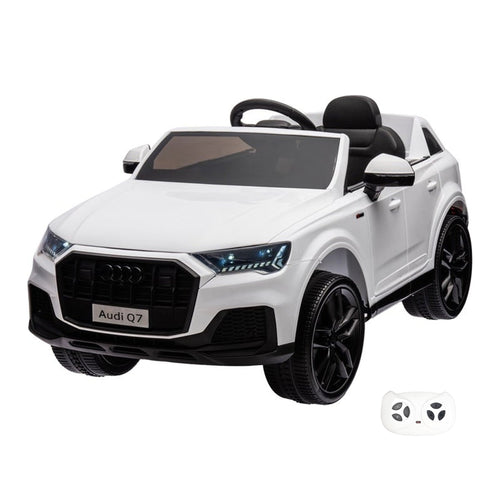 Audi Q7 blanche, voiture électrique enfant 12V, vue trois quarts avant avec sa télécommande