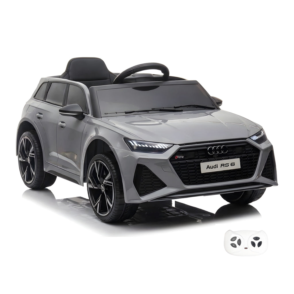 Audi RS6 grise, voiture électrique enfant 12V, vue trois quarts avant avec sa télécommande