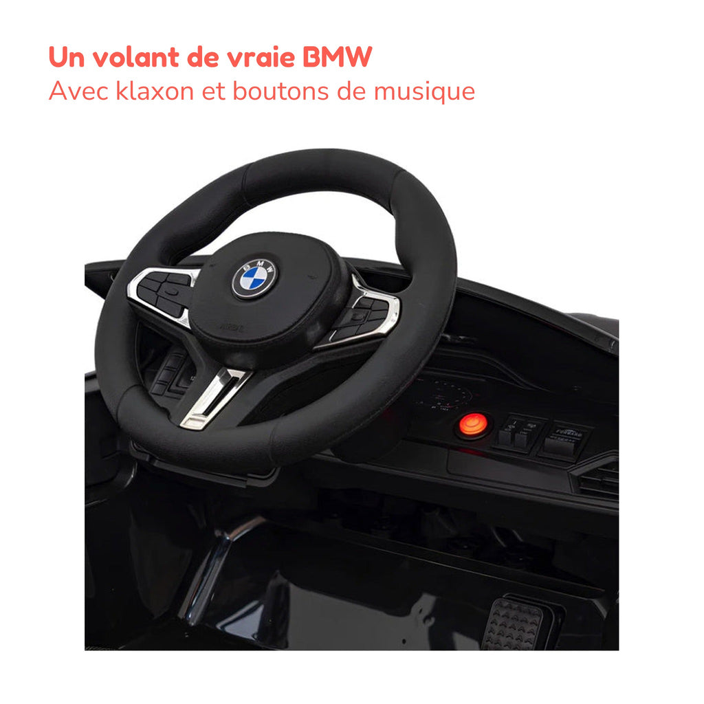 Volant de la BMW M4 enfant avec klaxon et boutons de musique