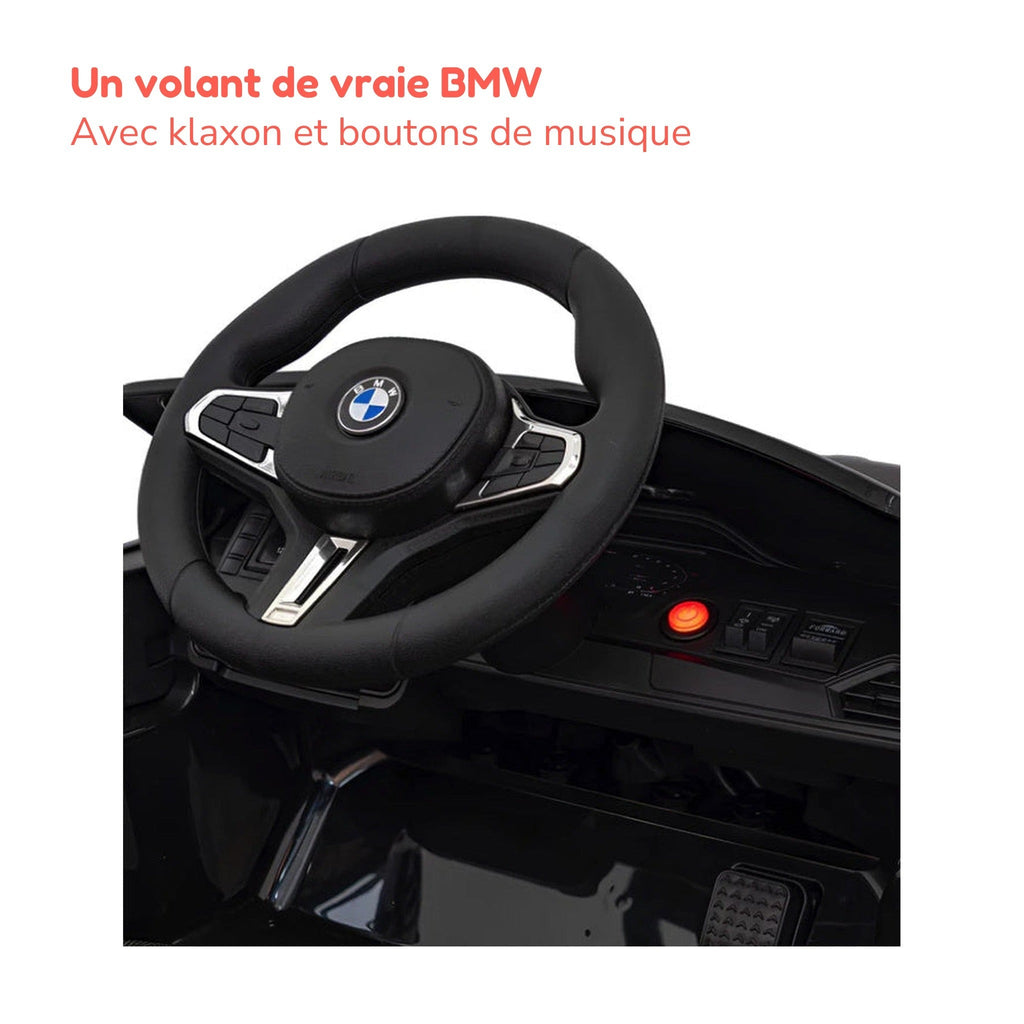 Volant de la BMW M4 enfant avec klaxon et boutons de musique