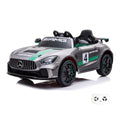 Mercedes GT4 AMG grise, voiture électrique enfant 12V avec écran MP4, vue trois quarts avant avec sa télécommande